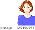 笑顔の女の子（青いセーター） 125490563