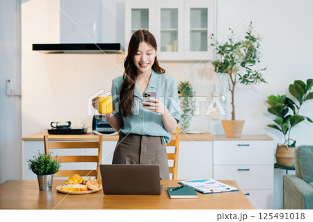 Successful, happy woman working online from home, lifestyle and small business. 125491018