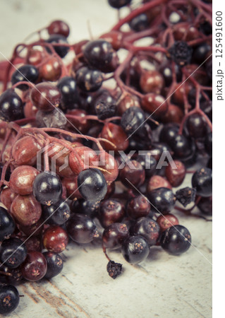 Fresh elderberry as source vitamins and minerals. Healthy nutrition, natural methods of treatment 125491600