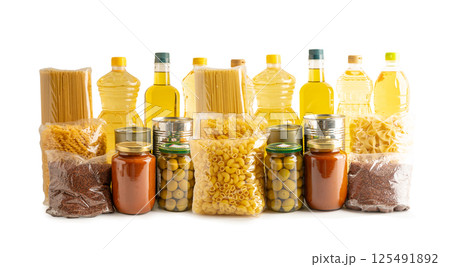 Foodstuffs in donation box isolated on white background. 125491892
