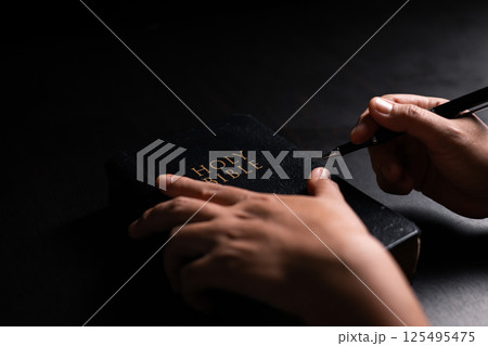 Woman of faith holds the Bible in her hand, believing deeply in the teachings of Jesus Christ and the presence of God, embodying her Christian religion. bible, person, hand, religion, book, faith. 125495475
