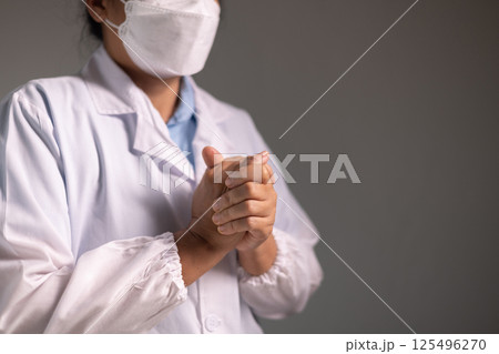 Doctor prays for the health of the person under their care, as medicine, nurses, and health care at the hospital work together to fight the disease. doctor, pray, health, person, medicine, care. Doctor prays for the health of the person under their care, as medicine, nurses, and health care at the hospital work together to fight the disease. doctor, pray, health, person, medicine, care. 125496270