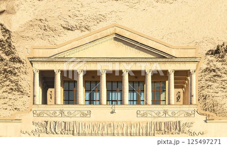 Architecture with ornate column and golden facade. Classical greek and roman structure with Architecture with ornate column and golden facade. Classical greek and roman structure with 125497271