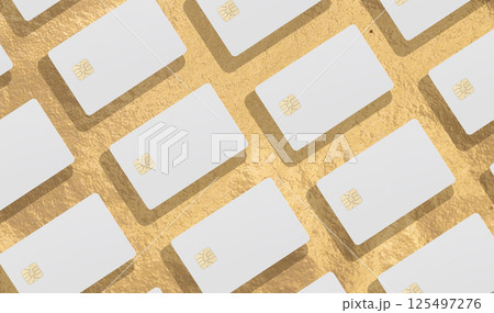 Bank cards arranged in a row, featuring a rich golden foil texture. The repeating pattern highlights Bank cards arranged in a row, featuring a rich golden foil texture. The repeating pattern highlights 125497276