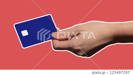 Card in female hand closeup. Plastic bankcard with chip showing in studio, modern design for 125497297
