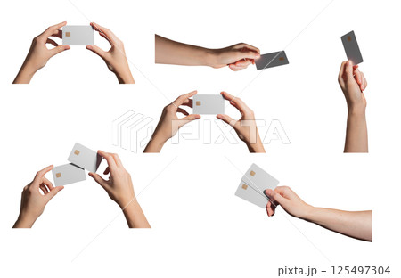 Card in hand. Female customer showing blank plastic bank credit and debit object with chip, clean Card in hand. Female customer showing blank plastic bank credit and debit object with chip, clean 125497304