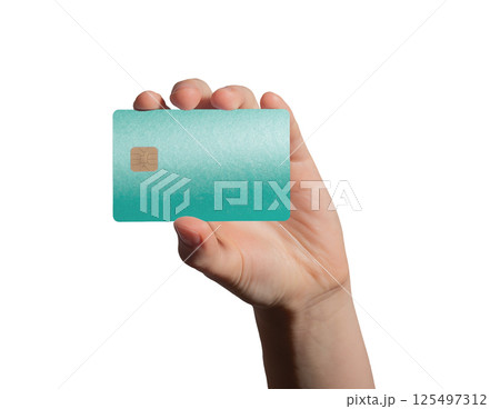Card showing in female hand. Turquoise bankcard with chip, front view, elegant design for electronic 125497312