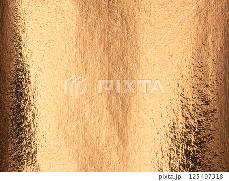 Copper foil background with a polished, golden texture. Shiny, glittering surface creating a retro, Copper foil background with a polished, golden texture. Shiny, glittering surface creating a retro, 125497318