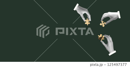 Hands holding puzzle pieces. Team of people in modern business setting showing strategy, teamwork, Hands holding puzzle pieces. Team of people in modern business setting showing strategy, teamwork, 125497377