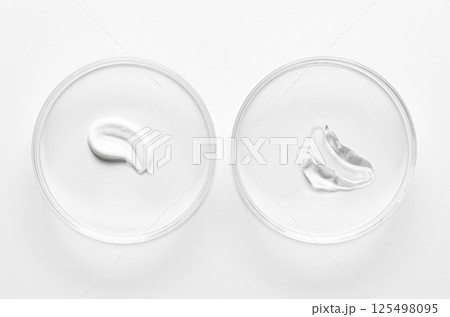 A sample of cosmetic moisturizing or anti-aging cream in a petri dish. A sample of cosmetic moisturizing or anti-aging cream in a petri dish. 125498095