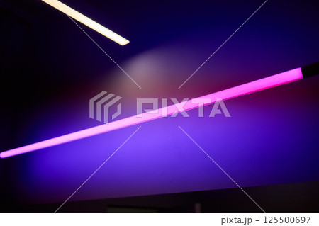 Vibrant and Colorful Neon Lights Displayed Beautifully on a Wall Creating a Stunning Atmosphere 125500697