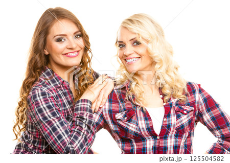 Portrait adult daughter with mother. 125504582