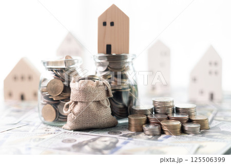 Finance home investments concept. Mortgage from the bank is essential for financing home investments, while insurance safeguards real estate property in volatile business of finance. house investment 125506399