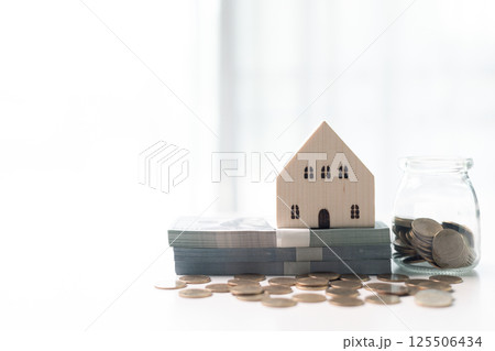 Finance home investments concept. Mortgage from the bank is essential for financing home investments, while insurance safeguards real estate property in volatile business of finance. house investment Finance home investments concept. Mortgage from the bank is essential for financing home investments, while insurance safeguards real estate property in volatile business of finance. house investment 125506434