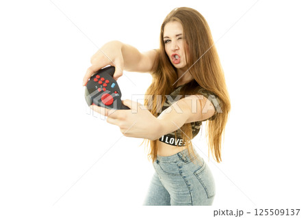 Gamer woman holding gaming pad 125509137