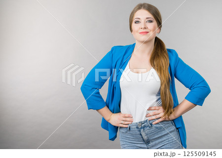 Portrait of beautiful cheerful young woman 125509145