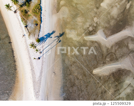 Aerial view of sandbar with turquoise sea at Laem had Koh khao yai Phang Nga Thailand, summer background and summer holiday concept Aerial view of sandbar with turquoise sea at Laem had Koh khao yai Phang Nga Thailand, summer background and summer holiday concept 125509329