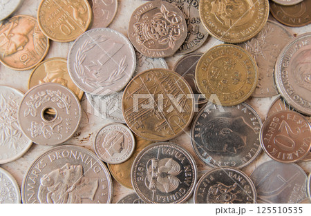 Old golden and silber coins. Old money from Europe. Various coins for business. Financial concept. 125510535