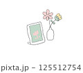 花と写真立て 125512754