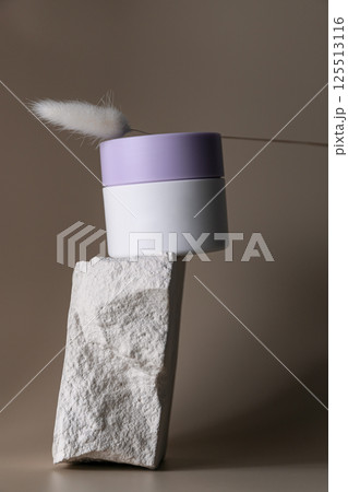 Cosmetic product in modern minimalist still life, empty label, mock up package 125513116