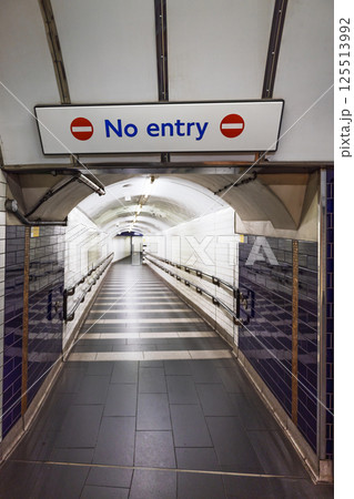 No Entry Sign at London Underground Stairway in a Quiet Subway Station Corridor No Entry Sign at London Underground Stairway in a Quiet Subway Station Corridor 125513992