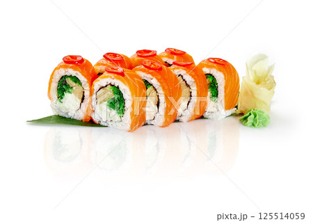 Philadelphia uramaki sushi rolls with salmon, cream cheese, and cucumber garnished with chili pepper on white background Philadelphia uramaki sushi rolls with salmon, cream cheese, and cucumber garnished with chili pepper on white background 125514059