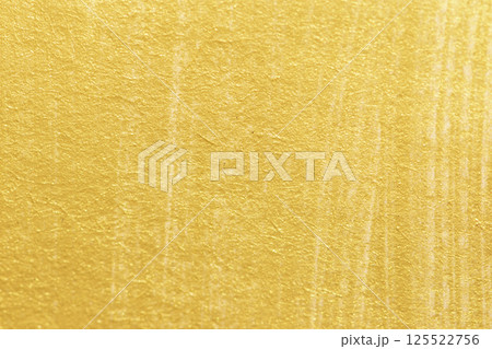 Gold acrylic paint texture on white paper background Gold acrylic paint texture on white paper background 125522756