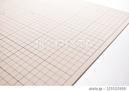 gray cutting mat board on white background with line and scale measure guide pattern for art design 125522930