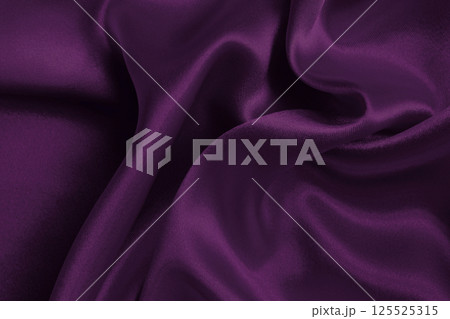 Purple fabric cloth texture for background and design art work, beautiful crumpled pattern of silk or linen. 125525315
