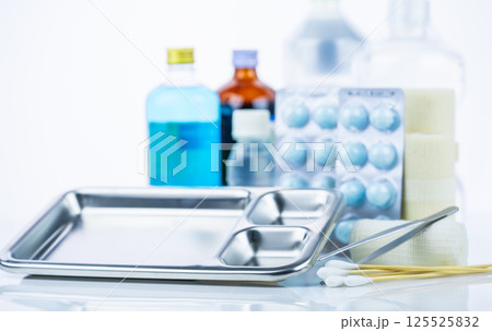 Medical equipment for treating infections. Wound care dressing set. Medical supplies for nurses. Conform bandage, forceps, cotton stick, alcohol. Sterile dressing materials. Healthcare equipment. 125525832