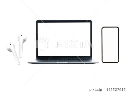 Laptop, smartphone, and earbuds on a white background, isolated on white 125527615