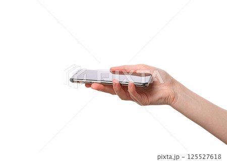 A person is holding a smartphone with a clean, modern look, isolated on white 125527618