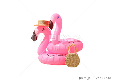 Bright pink flamingo pool floats ready for a fun summer vacation, isolated on white background 125527638