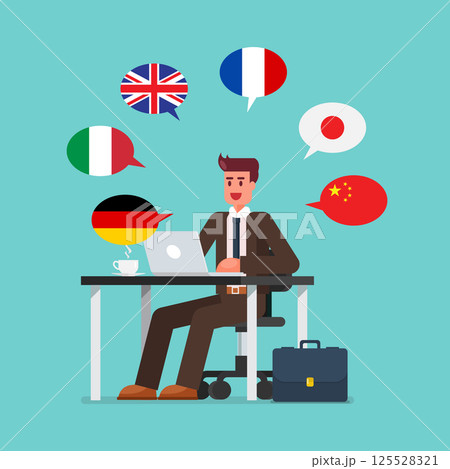 Business man working on a laptop speaking many different languages 125528321