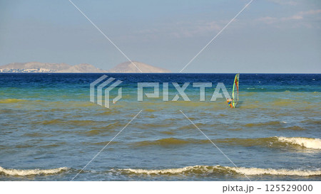 Windsurfing in Koktebel, Crimea with view of White Rock mountain Windsurfing in Koktebel, Crimea with view of White Rock mountain 125529000