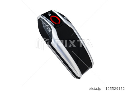 Modernf wireless car key ignition isolated on white background. Wireless start engine key. Car key remote isolated over white. Modern car keys. Car keys close up. 125529152