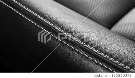 Modern Luxury car inside. Interior of prestige modern car. Comfortable leather seats. Perforated leather with stitching isolated on black background. Modern car interior. Car detailing. Car inside 125530378