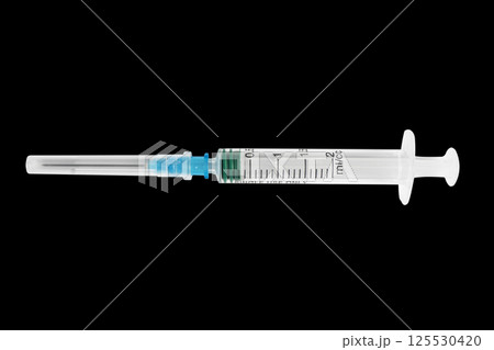 Empty syringe close up isolated on black background. Vaccine plastic hypodermic syringe. Close-up of medical syringe. Syringe for injection and vaccination solution. Empty syringe close up isolated on black background. Vaccine plastic hypodermic syringe. Close-up of medical syringe. Syringe for injection and vaccination solution. 125530420
