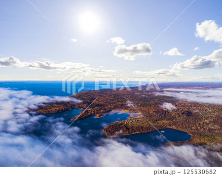 Aerial view of seashore with beach, lagoons. Coastline with sand and water. Landscape. Aerial photography. Birdseye. Sky, clouds. Stunning sky clouds. Sky landscape. Aerial view of seashore with beach, lagoons. Coastline with sand and water. Landscape. Aerial photography. Birdseye. Sky, clouds. Stunning sky clouds. Sky landscape. 125530682