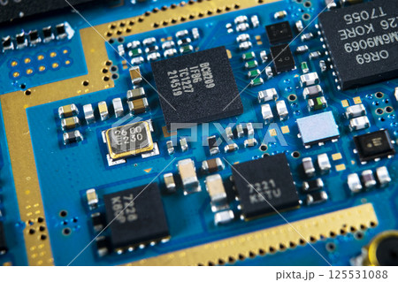 Macro shot of Circuit board with resistors microchips and electronic components. Computer hardware technology. Integrated communication processor. Information engineering. Semiconductor. PCB. Closeup 125531088