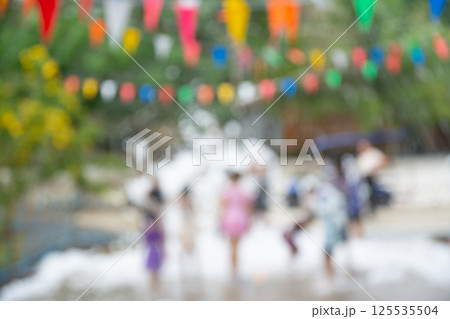 Blurred image  of  Children  have fun at  foam party bubble. 125535504