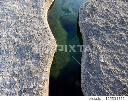 Rocky shore of the Caspian Sea. Rocky shore of the Caspian Sea. 125535531