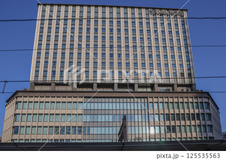 March 23 2025 Modern Commercial Building With Statue in Urban Cityscape, Japan 125535563