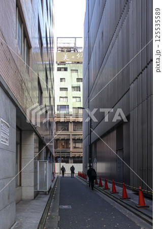 Between Buildings with People Strolling and Modern Architecture, Japan Dec 10 2024 Between Buildings with People Strolling and Modern Architecture, Japan Dec 10 2024 125535589
