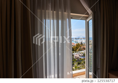 Apartment with sea view, open balcony door Apartment with sea view, open balcony door 125538717
