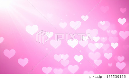 Soft hearts float gracefully against pink gradient background, creating dreamy atmosphere filled with glowing light effects. This enchanting scene evokes feelings of love and warmth 125539126