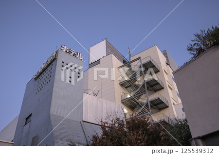 Architecture of an Urban Hotel Building at Dusk with Clear Sky Dec 8 2024 125539312