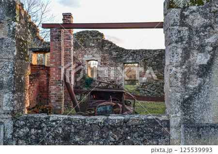 Destroyed cars during World War 2 in the city Oradour sur Glane France 125539993