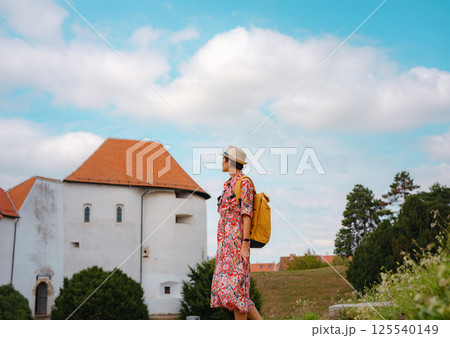 Woman Walking Through the Historic Center of Varazdin Woman Walking Through the Historic Center of Varazdin 125540149