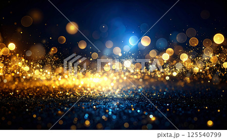 Magical bokeh lights and sparkling particles create mesmerizing scene in deep blue night sky, evoking sense of wonder and enchantment 125540799